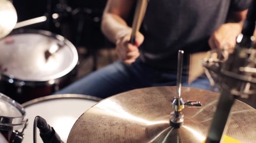 Male Musician Playing Drums And Cymbals At Studio 4