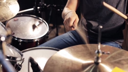 Male Musician Playing Drums And Cymbals At Studio 9