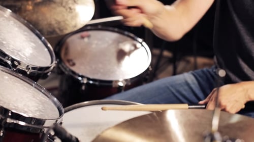 Male Musician Playing Drums And Cymbals At Studio 10