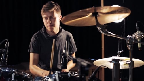 Male Musician Playing Drums And Cymbals At Studio 17