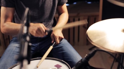 Male Musician Playing Drums And Cymbals At Studio 22