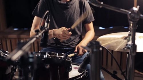 Male Musician Playing Drums And Cymbals At Studio 24