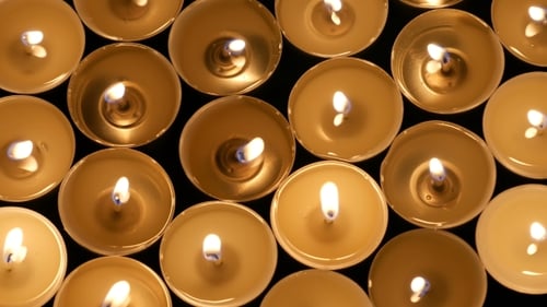 Tea Candles Burning At Night