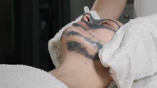Woman Receiving Facial Spa Treatment