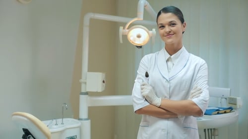 Woman Dentist At Office