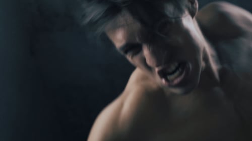 Shirtless Man Shouting, Intense Fitness Training Close Up