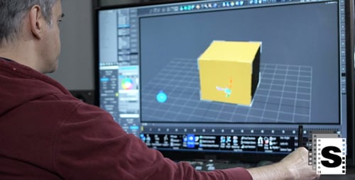 Man Creates 3D Model on Computer Program