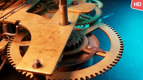 Clock Gears Turning in Close Up