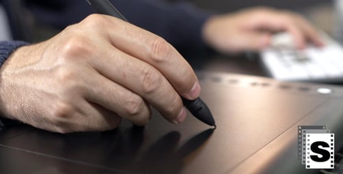 Hand Drawing on Graphics Tablet Close Up