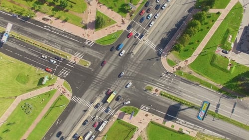 aerial view of junction of road with heavy traffic