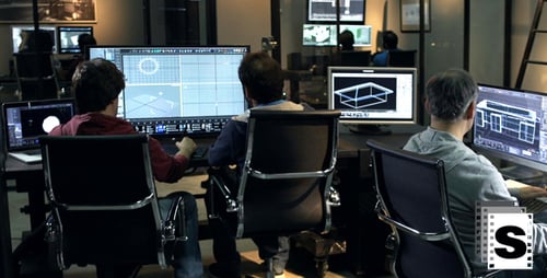 Architects Designing Blueprints in a Modern Office