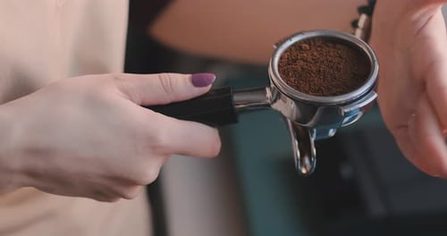 Making Ground Coffee with Tamping Fresh Coffee. Close-Up. Making Coffee From Start To finish.Tamping