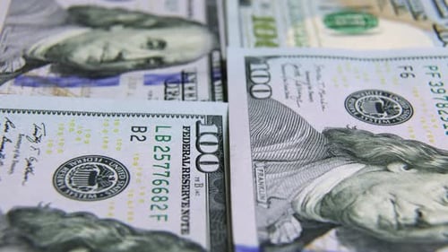 Neat Stacks of One Hundred Dollar Bills