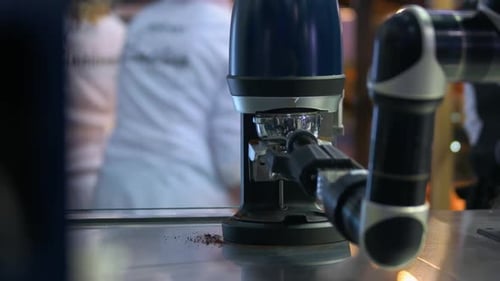 Robotic Coffee Machine Arm with Crushed Dried Beans