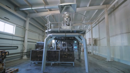 Large Machines For Packing Cereals, Grains, As Well As Groceries.