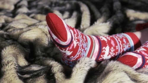 Festive Socks on Fur Blanket