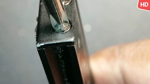 Tightening Screw on Metal Object with Screwdriver