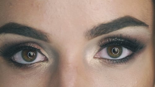 Woman with Glamorous Eye Makeup Close Up