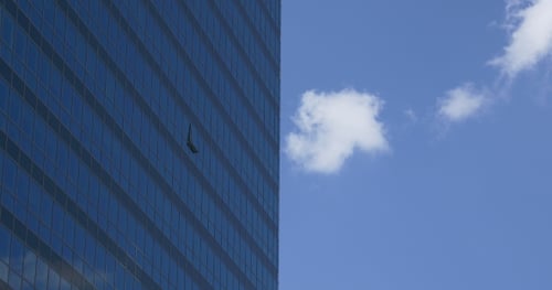 Clouds Run Near Blue High-riser