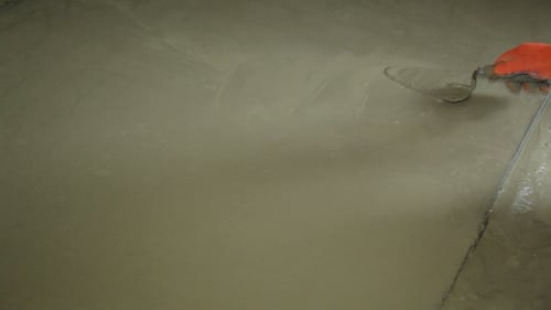 Smoothing Concrete Floor with Trowel