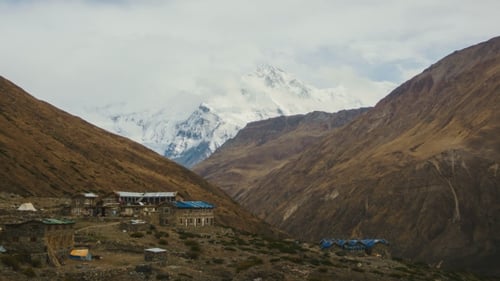 Mountain, Sky And Moving Clouds