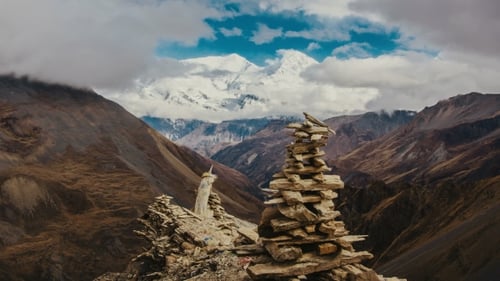 Mountain, Sky And Moving Clouds