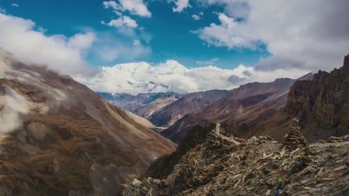 Mountain, Sky And Moving Clouds