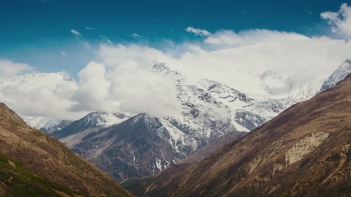Mountain, Sky And Moving Clouds