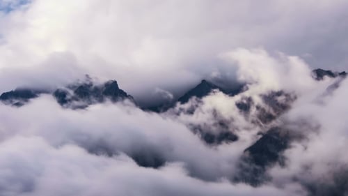Mountain, Sky And Moving Clouds