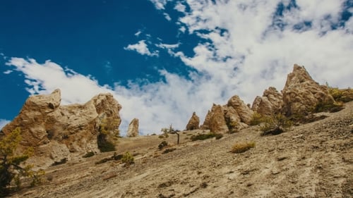 Mountain, Sky And Moving Clouds