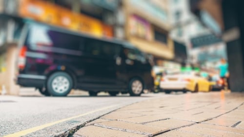 Busy City Street with Passing Traffic