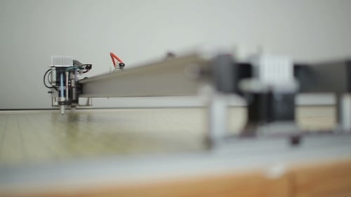 Head Of Laser Cutting Machine Goes Alongcrossbar