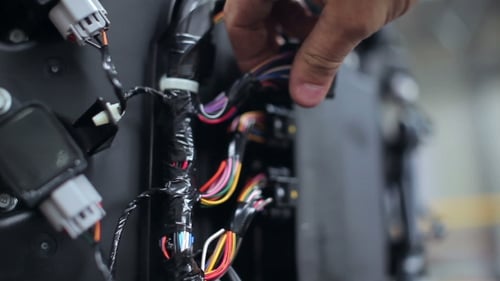 Repairer Tests Wiring At The Yacht Centre