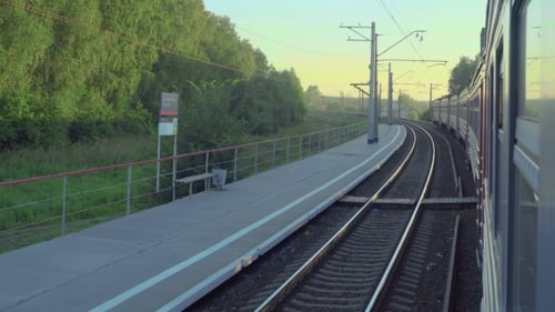 Suburban Train At Sunset