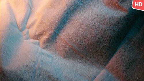 Wrinkled Fabric with Turquoise and Peach Lighting