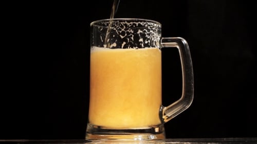 Amber Beer Poured in Glass Mug