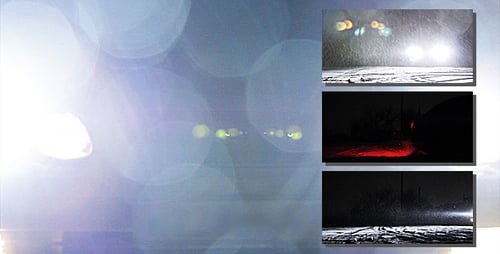 Car Driving at Night in Falling Snow