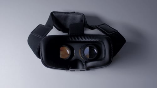 Virtual Reality Headset on Gray Surface Zooming In