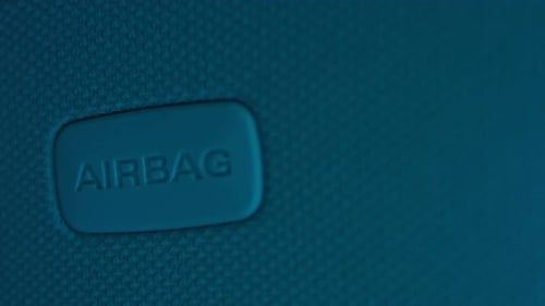 Close Up Shot of Airbag Sign on a Dashboard