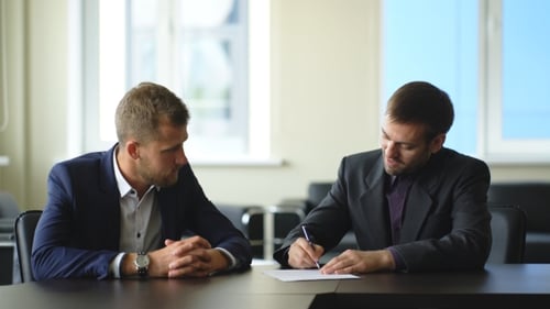 Businessman Signing a Contract