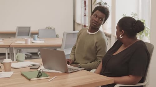 Group of Coworkers Chatting in Office