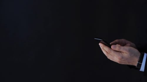 Businessman Hands Touching Screen Of Smartphone