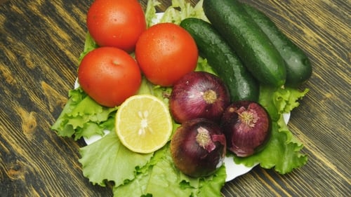 Fresh Vegetables for Salad on White Plate