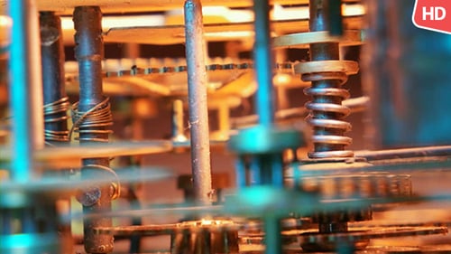Clock Gears Turning with Mechanical Precision