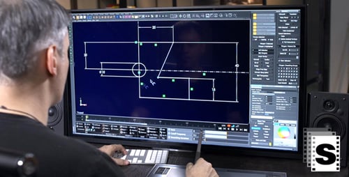 Man Designs Geometry Using CAD Program at Computer