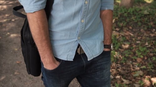 Young Happy Attractive IT Man Walking Through The Park