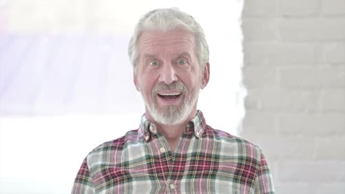 Portrait of Casual Old Man Feeling Amazed