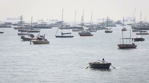 Tourist And Fisher Boats By The Harbour