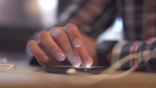 Student Man Using Smart Phone Cafe