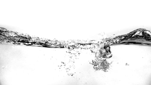 Wasserwellen auf weißem Hintergrund